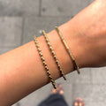 Drei einzigartige Armreif Designs - 14 Karat