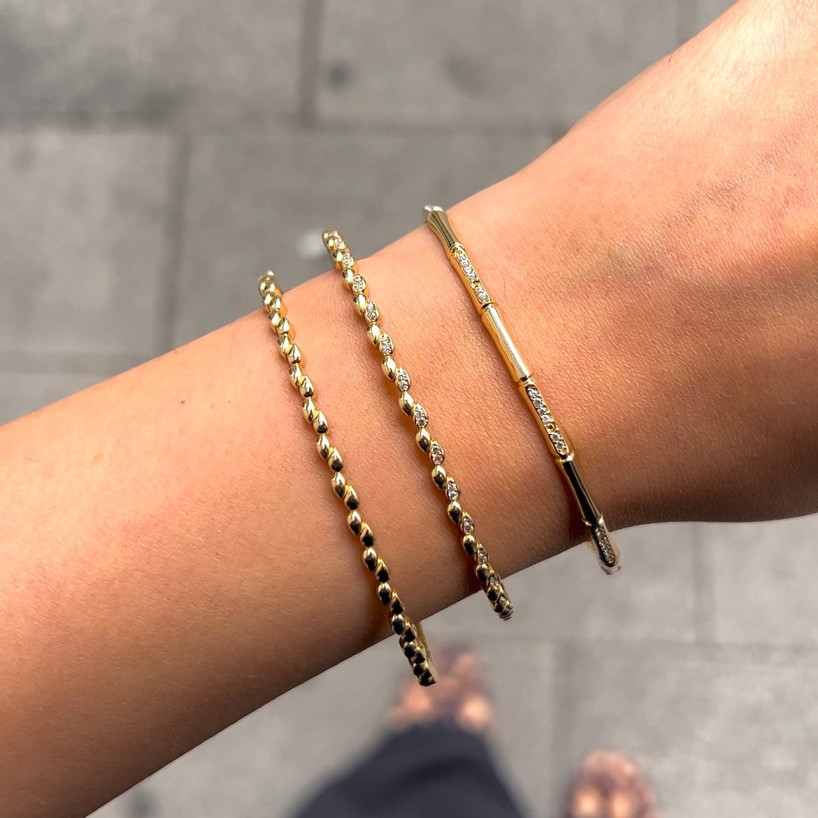 Drei einzigartige Armreif Designs - 14 Karat