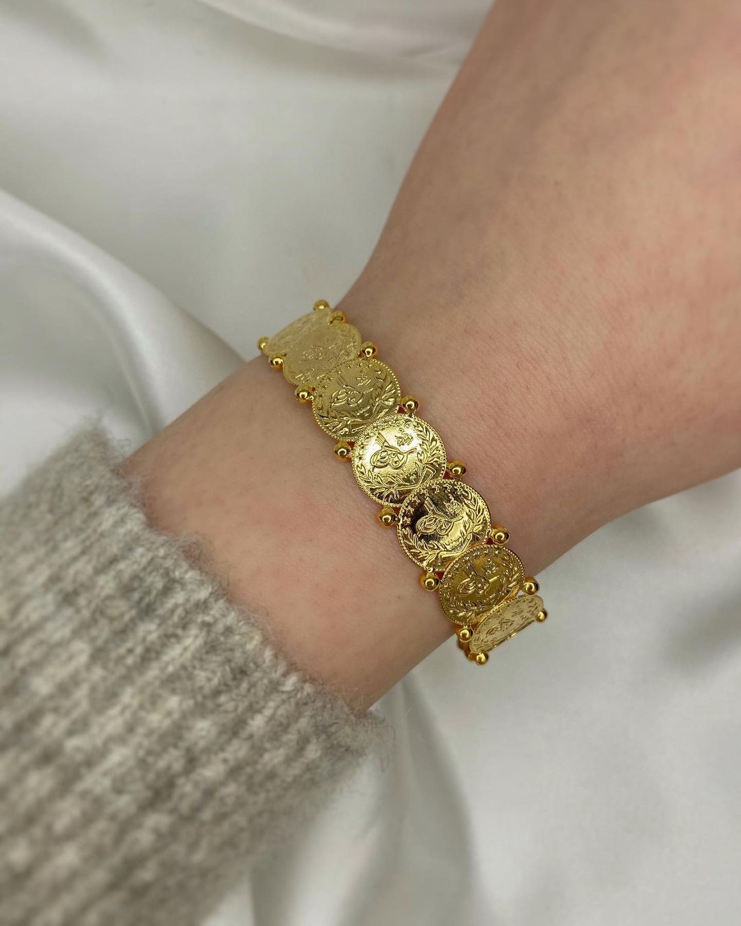 Goldmünzen-Armschmuck