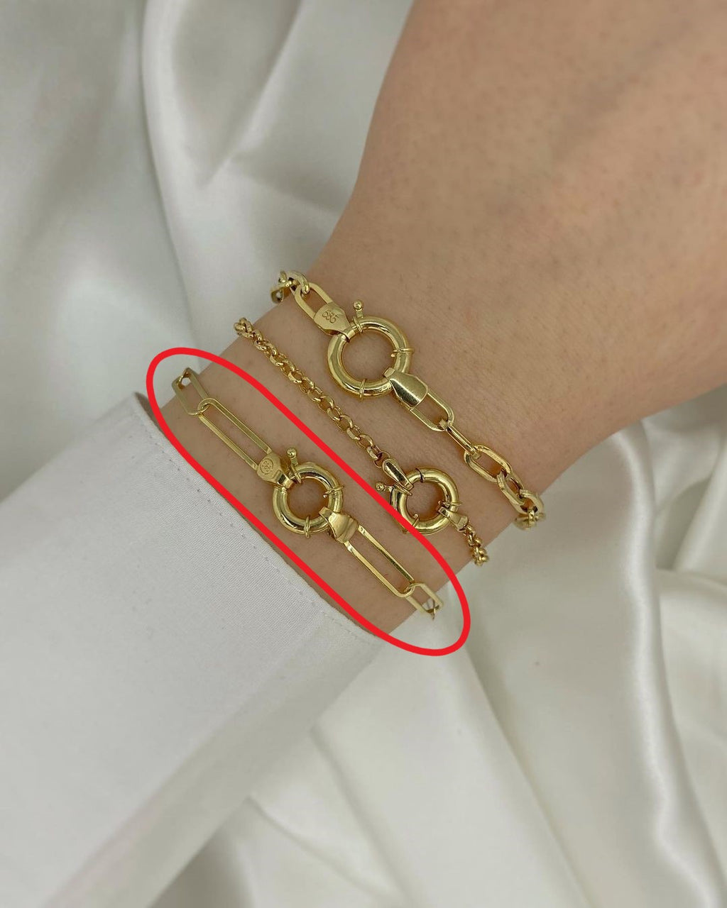 Kreisschloss-Armschmuck in ver. Varianten