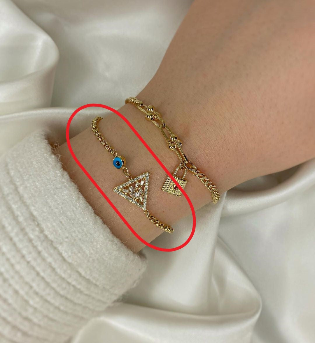 Amara Gold-Armschmuck mit Anhängern