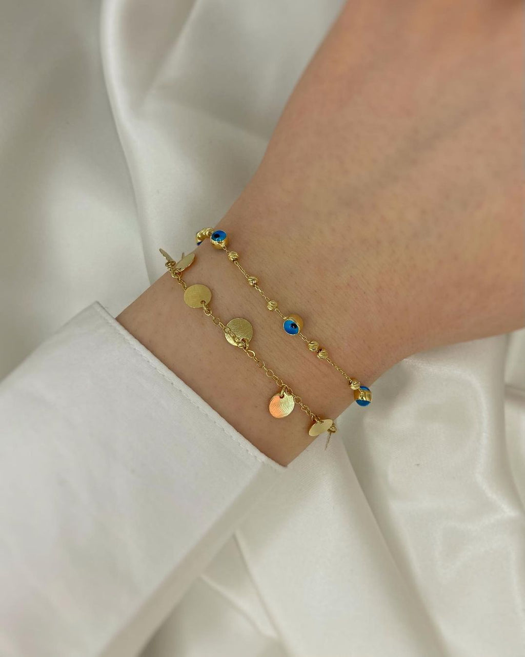 Navaé Goldarmschmuck mit Anhänger