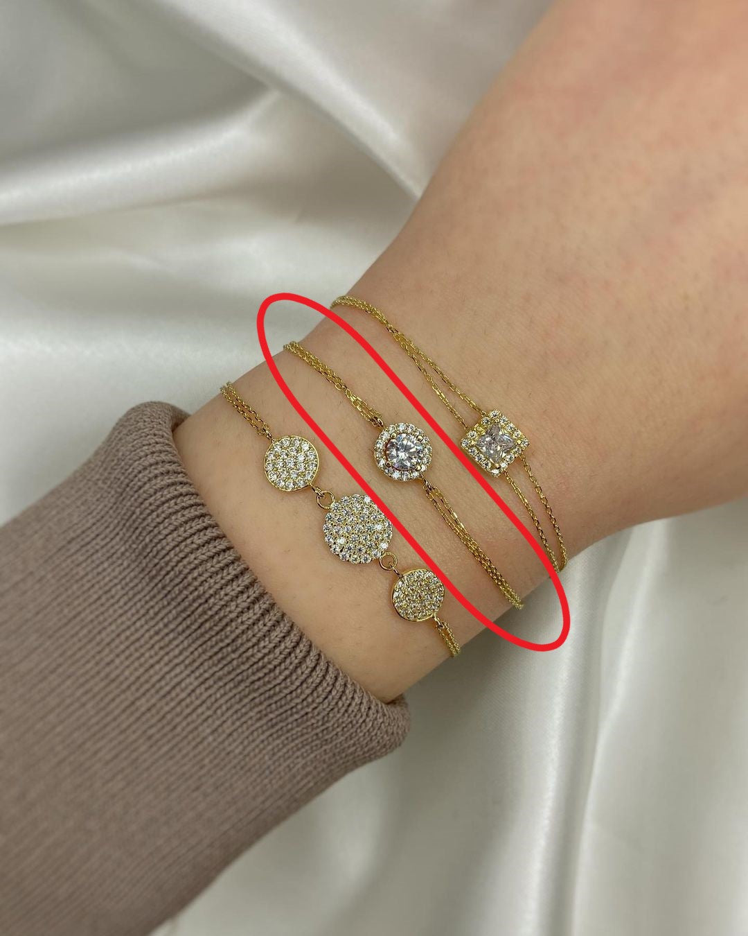 Goldarmschmuck mit Zirkonien