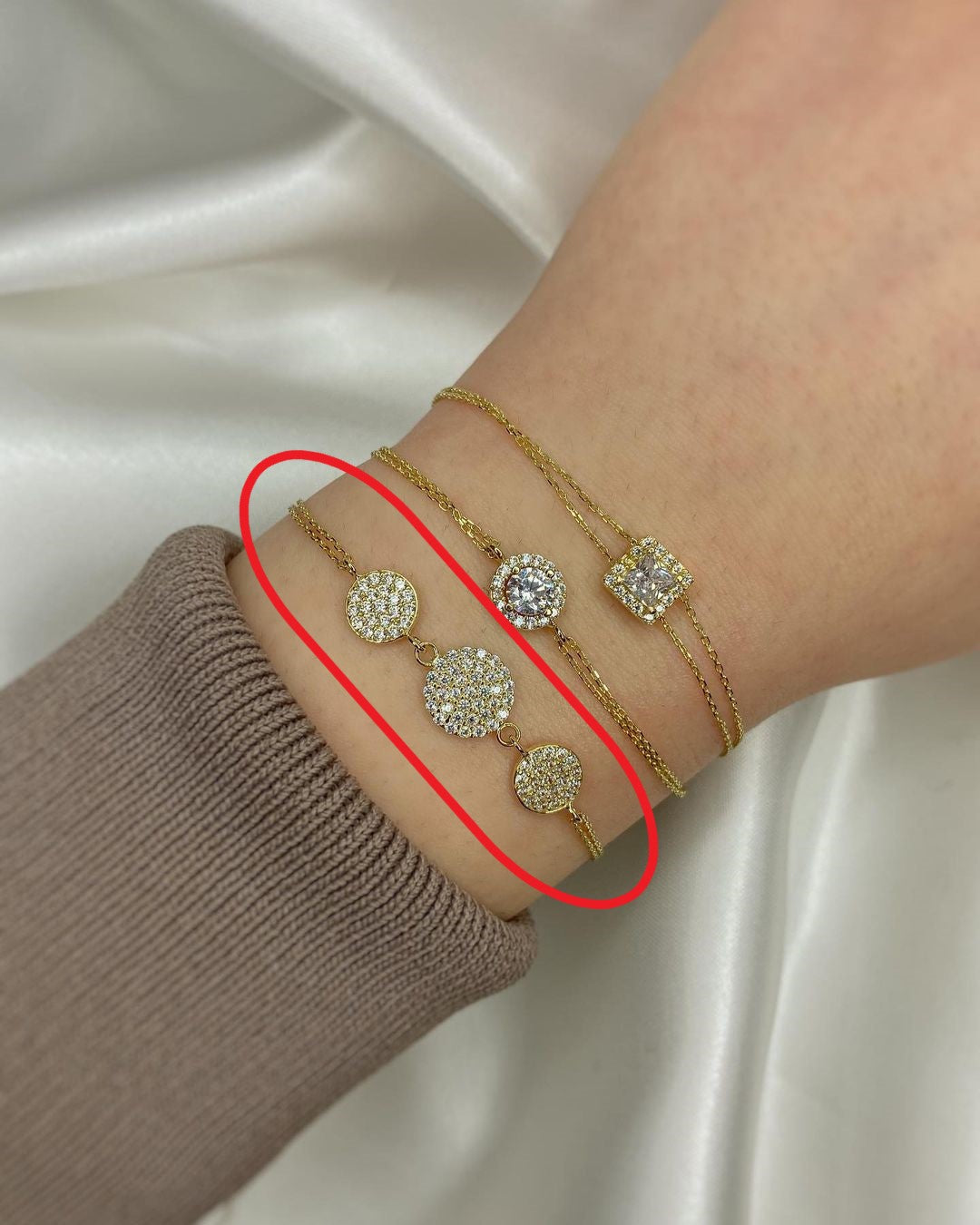 Goldarmschmuck mit Zirkonien