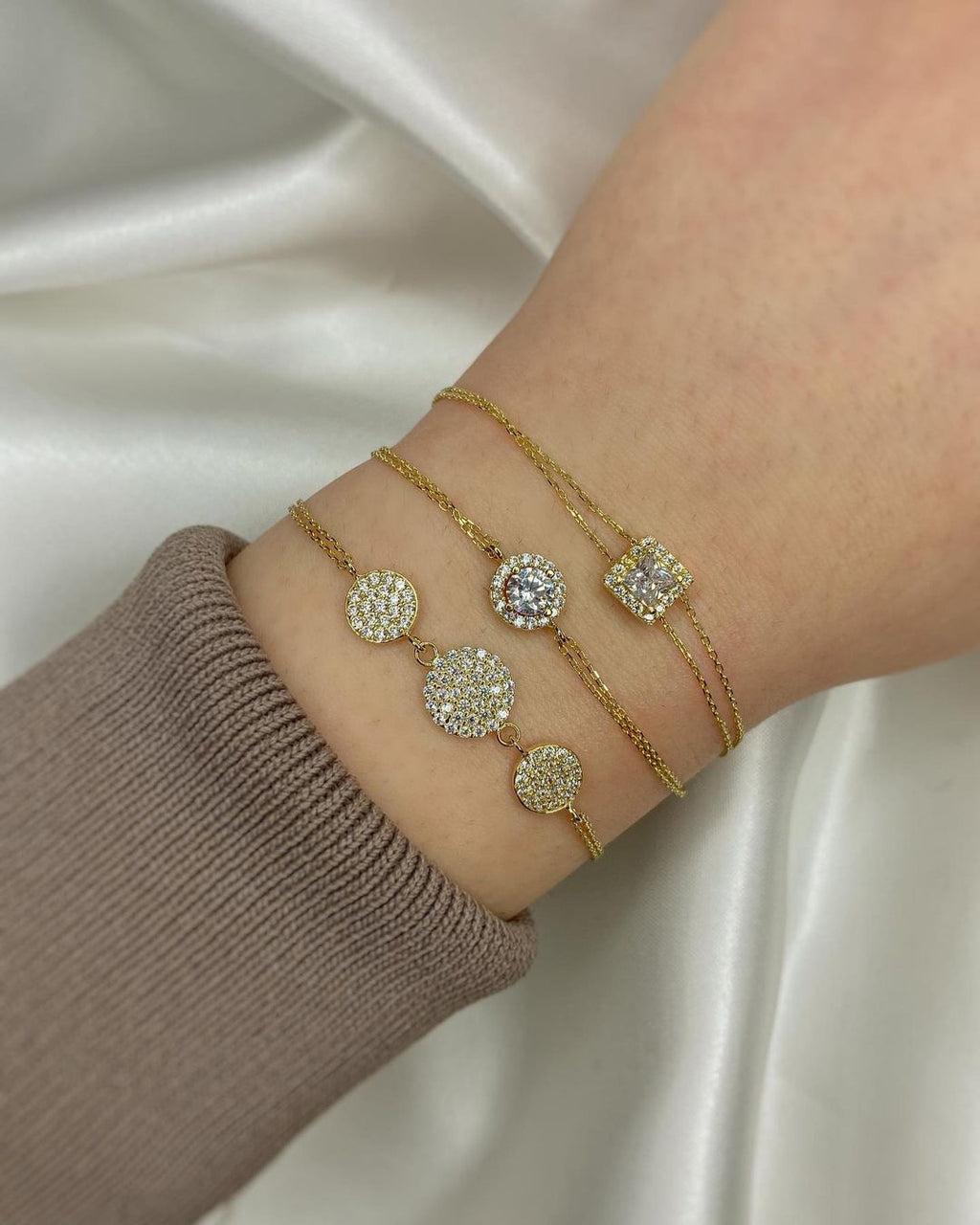 Goldarmschmuck mit Zirkonien