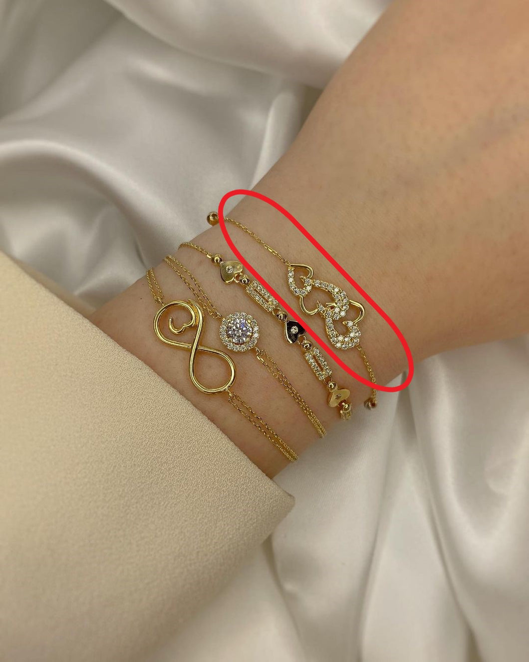 Goldarmschmuck mit Symbolen ver. Varianten