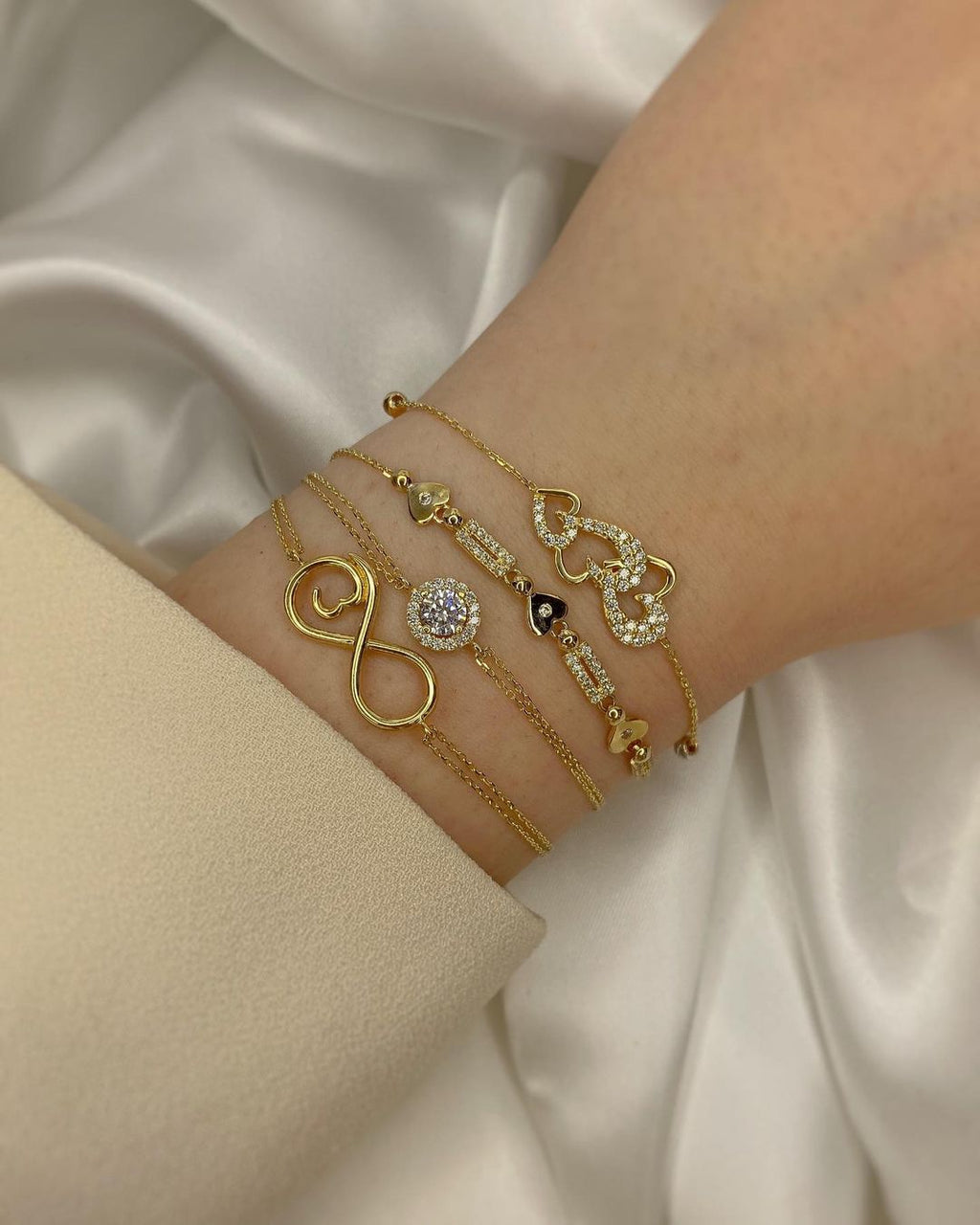 Bella Éternité Goldarmschmuck mit Symbolen ver. Varianten