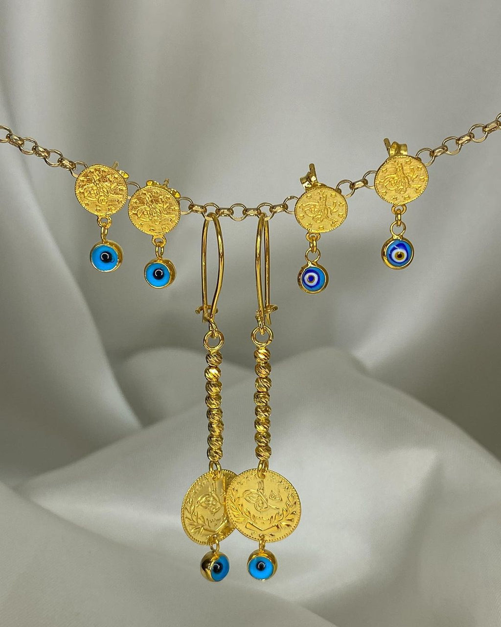 Gold-Münzohrringe mit Nazar-Symbol in ver. Varianten