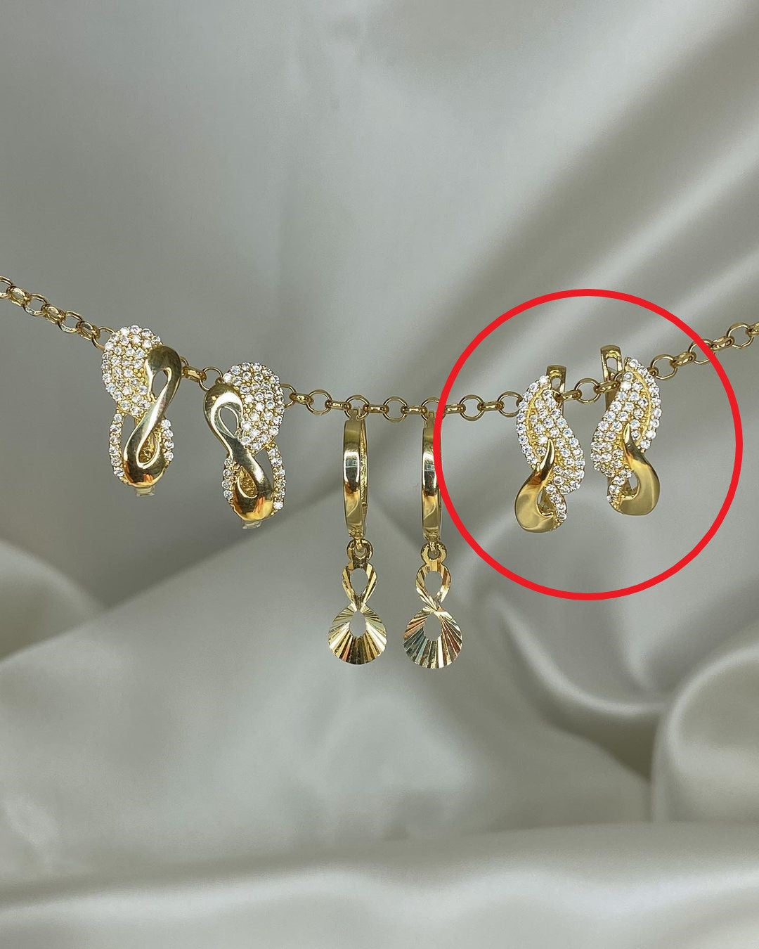 Gold-Ohrringe im Swing-Design in ver. Varianten