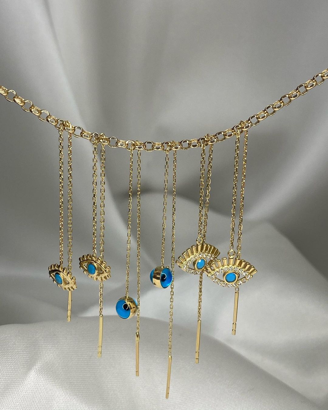 Gold-Ohrringe mit Nazar-Symbol in ver. Varianten