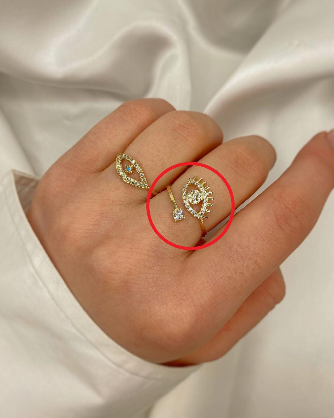 Ringe mit Iris-Symbol in ver. Varianten